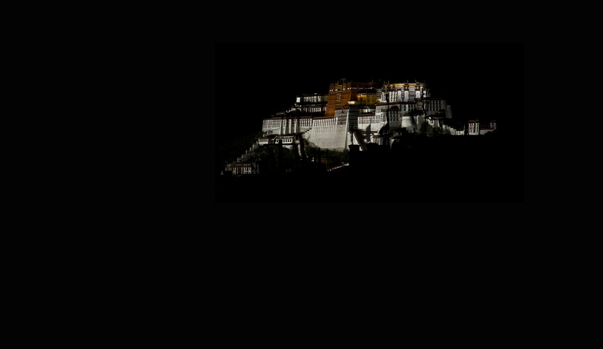 Perfect darkness Lhasa's Potala palace floats ghostlike above the darkened city.&nbsp;Photo: Billie Hughes