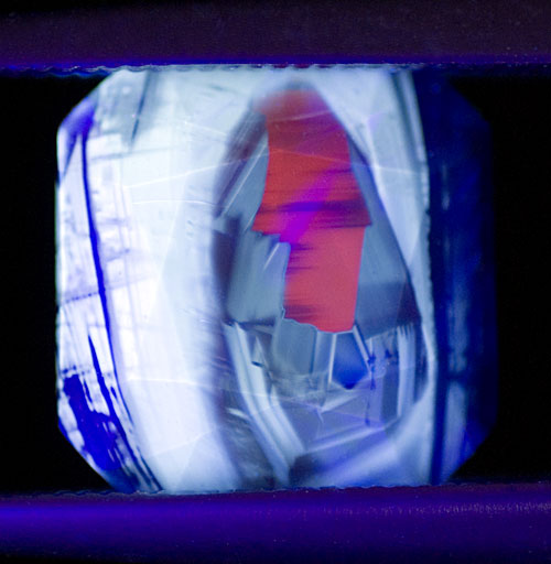 Chalky blue with red SW fluorescence