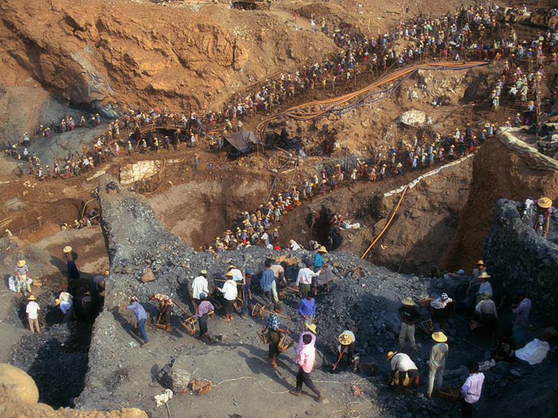 Building the pyramids Over 10,000 miners snake up the hillside at Hpakangyi.