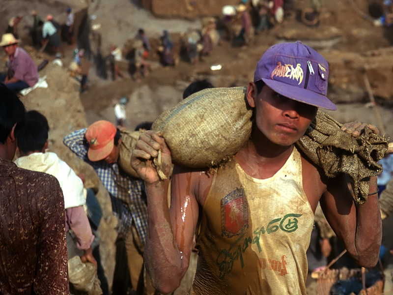 Building the pyramids Over 10,000 miners snake up the hillside at Hpakangyi.