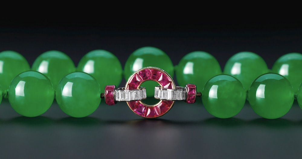 A room with a view U Tin Ngwe, who went from taxi driver to jade kingpin almost overnight, stands atop a small fortune of jade at his Hpakan home.